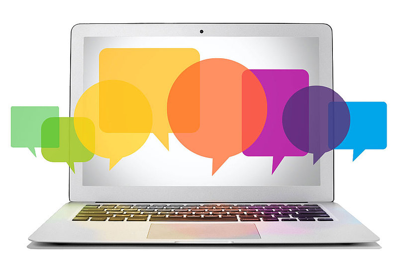 laptop with speech bubbles