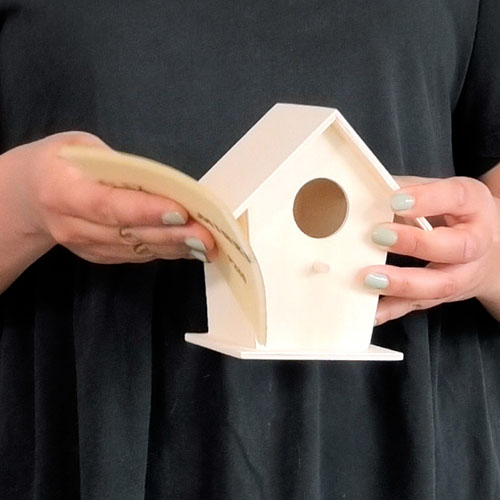 Sanding the bird house